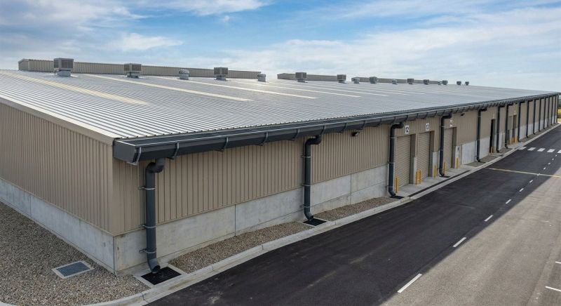 How Proper Commercial Gutters Protect Buildings From Water Damage